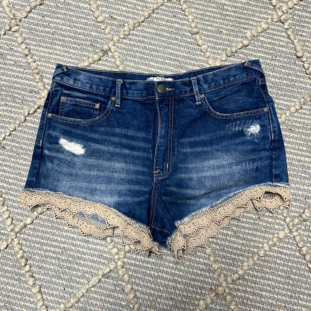 Jean shorts with lace him details